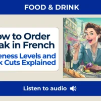 How to Order Steak in French &mdash; Doneness Levels and Steak Cuts Explained &mdash; Smiling French woman eating steak at Paris caf&eacute; with wine and baguette